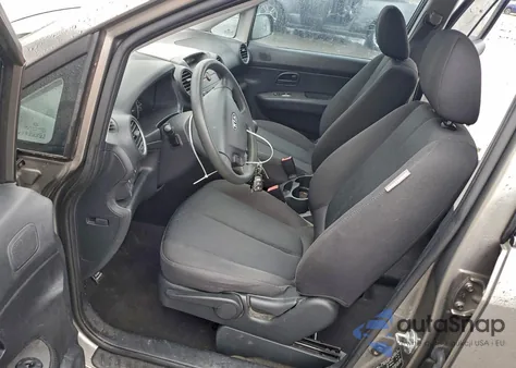 2009 Kia Rondo Base из США, поврежденный, VIN KNAFG528997267256